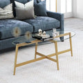 Table basse ovale en verre trempé – Laiton / Bronze noirci, pieds fuselés, pour 2 à 4 personnes