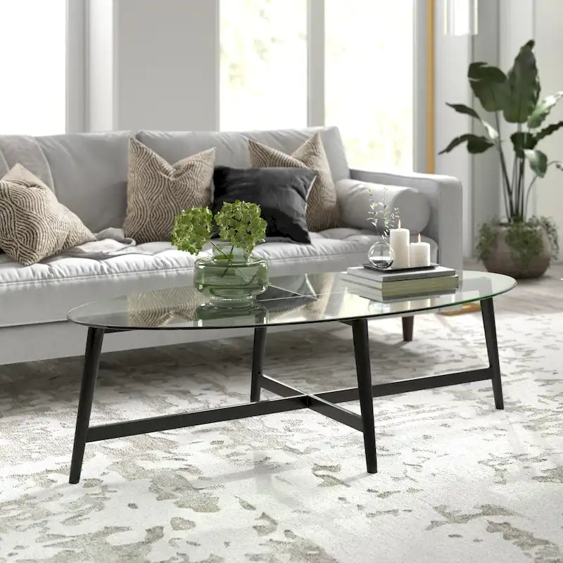 Table basse ovale en verre trempé – Laiton / Bronze noirci, pieds fuselés, pour 2 à 4 personnes